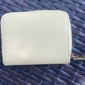 Cute yellow a•n•d eawy wallet.  Never used!  In new condition.